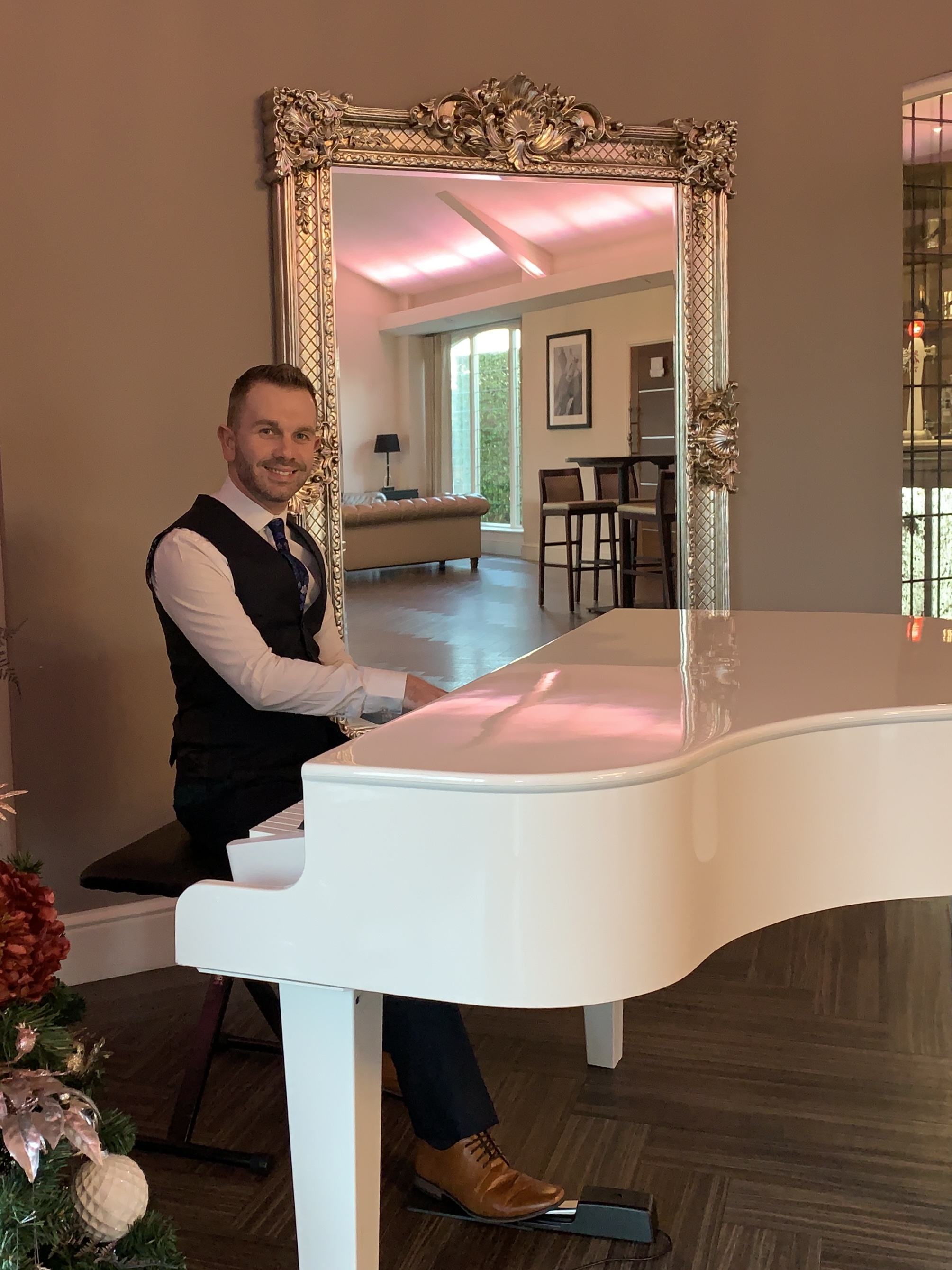 Wedding drinks reception piano at Colshaw Hall by wedding pianist Craig Smith