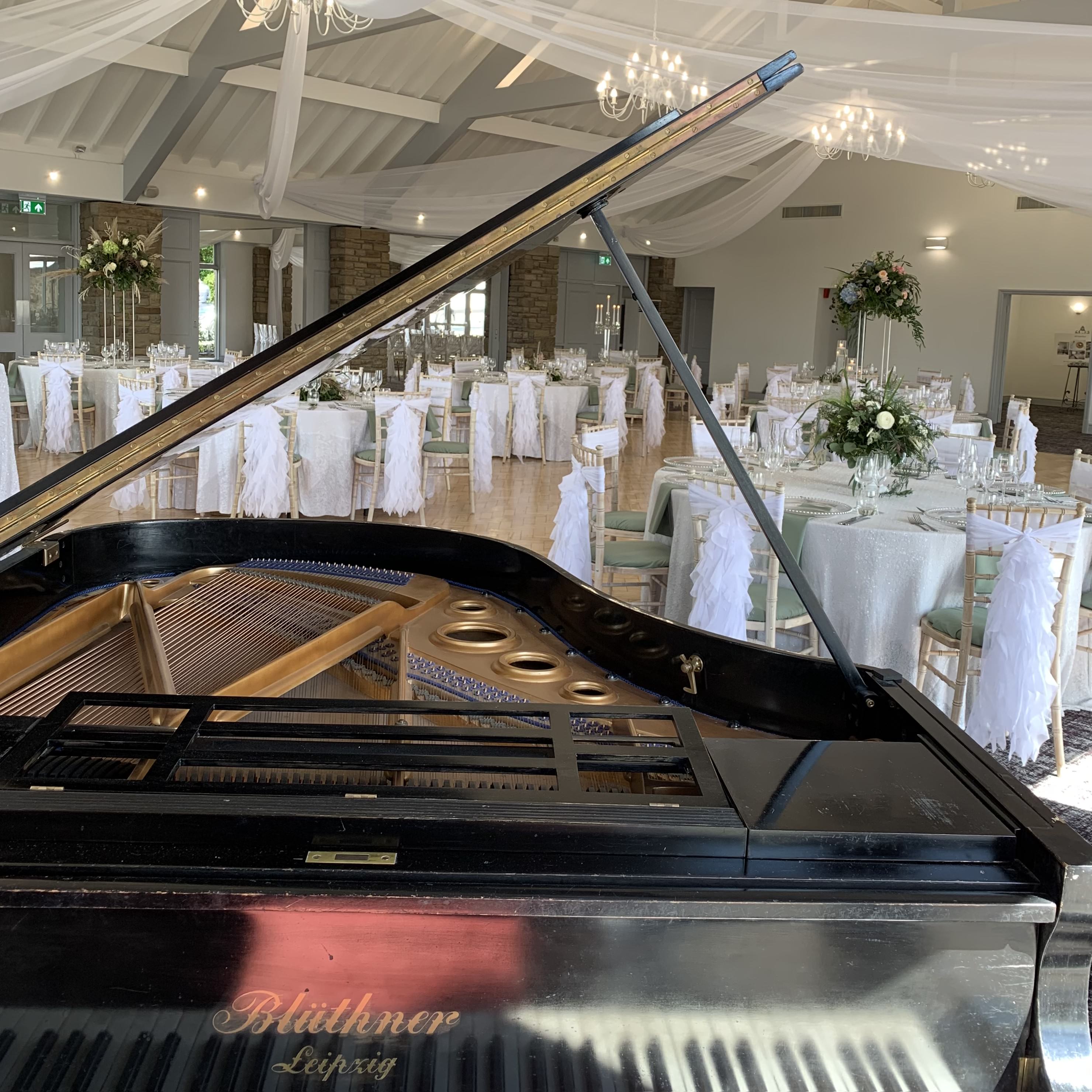 Wedding pianist Craig Smith plays Mytton Fold's grand piano for a wedding breakfast